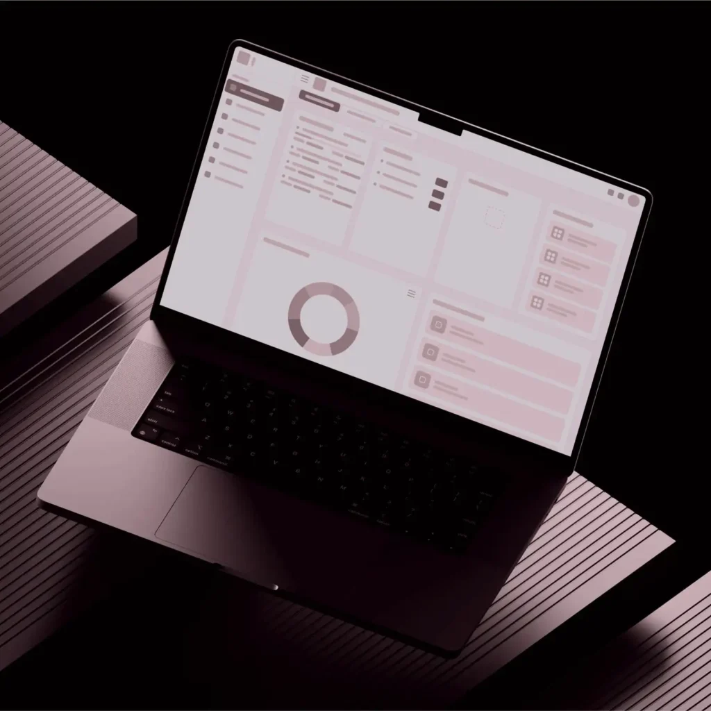 Modern HR management software dashboard displayed on laptop screen featuring employee management, analytics, reporting, and workforce administration tools for businesses.